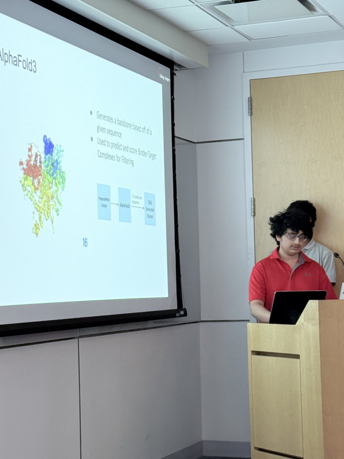Presenting a science topic. The slide shown discusses AlphaFold3.